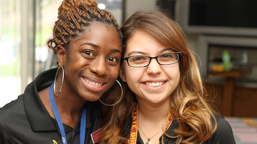 Two women together smiling